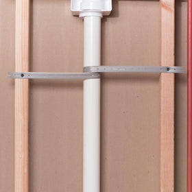 Oatey pipe strap installing pipes to joists for secure mounting