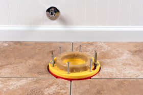 Oatey Set-Rite installation demo illustrating flange extension above finished flooring.
