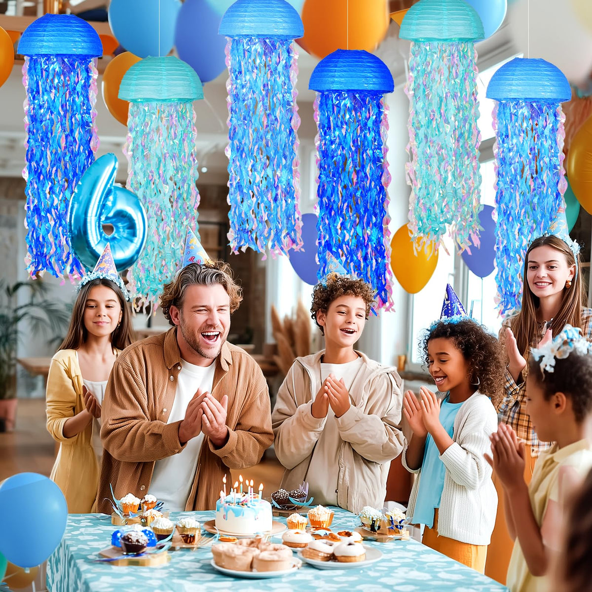 OBXT jellyfish lanterns with iridescent streamers add shimmer for mermaid parties