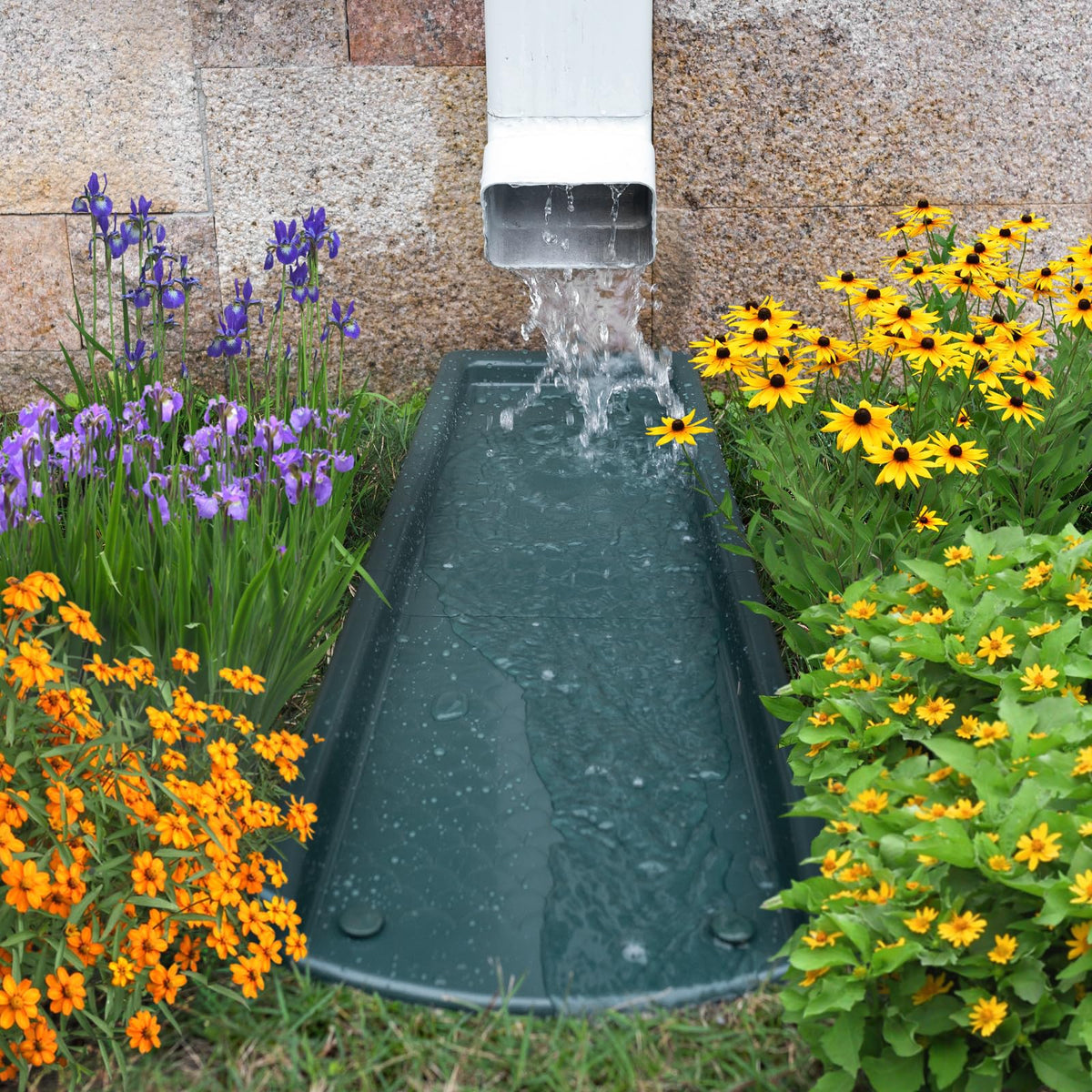 Ogutter 24-inch downspout extension in green ready to improve drainage