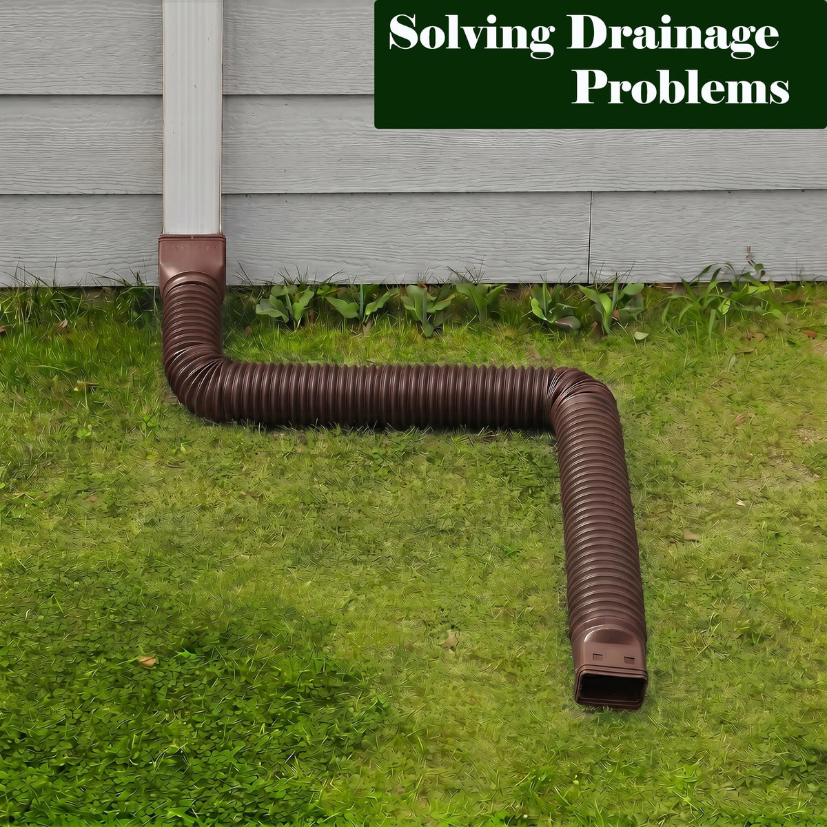 Ogutter downspout extension buried underground for discreet drainage.