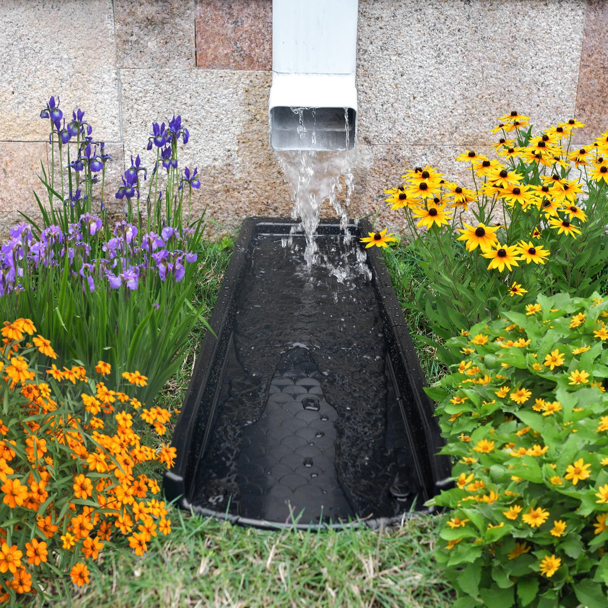 Ogutter pack contents with splash block and piles for easy install