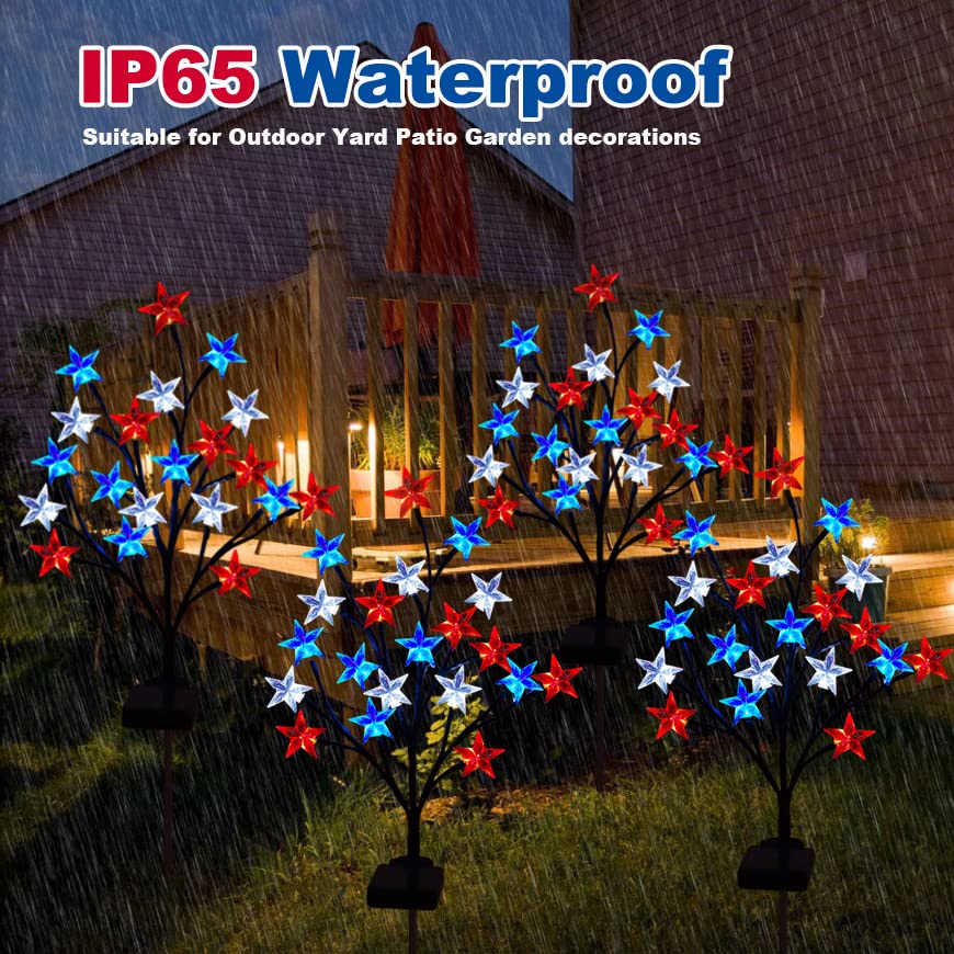 Ohwewant red white blue star pathway light lighting a yard at dusk.