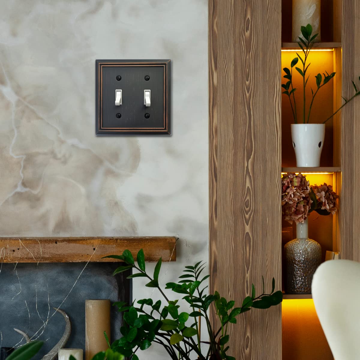 OKAWYC Adler aged bronze finish complements lighting fixtures and cabinetry.