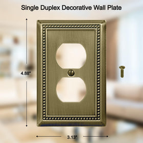 Close-up of the beaded edge texture in antique brass enhancing switches