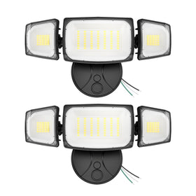 Olafus two-pack outdoor flood lights illuminate a yard with broad coverage