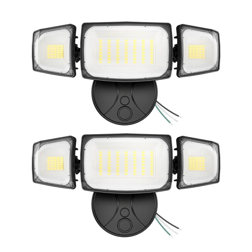 Olafus two-pack outdoor flood lights illuminate a yard with broad coverage