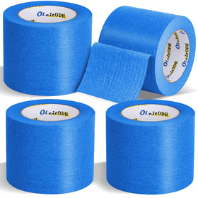 Oleitodh blue painter's tape edge-finishing roll on wall for clean masking.