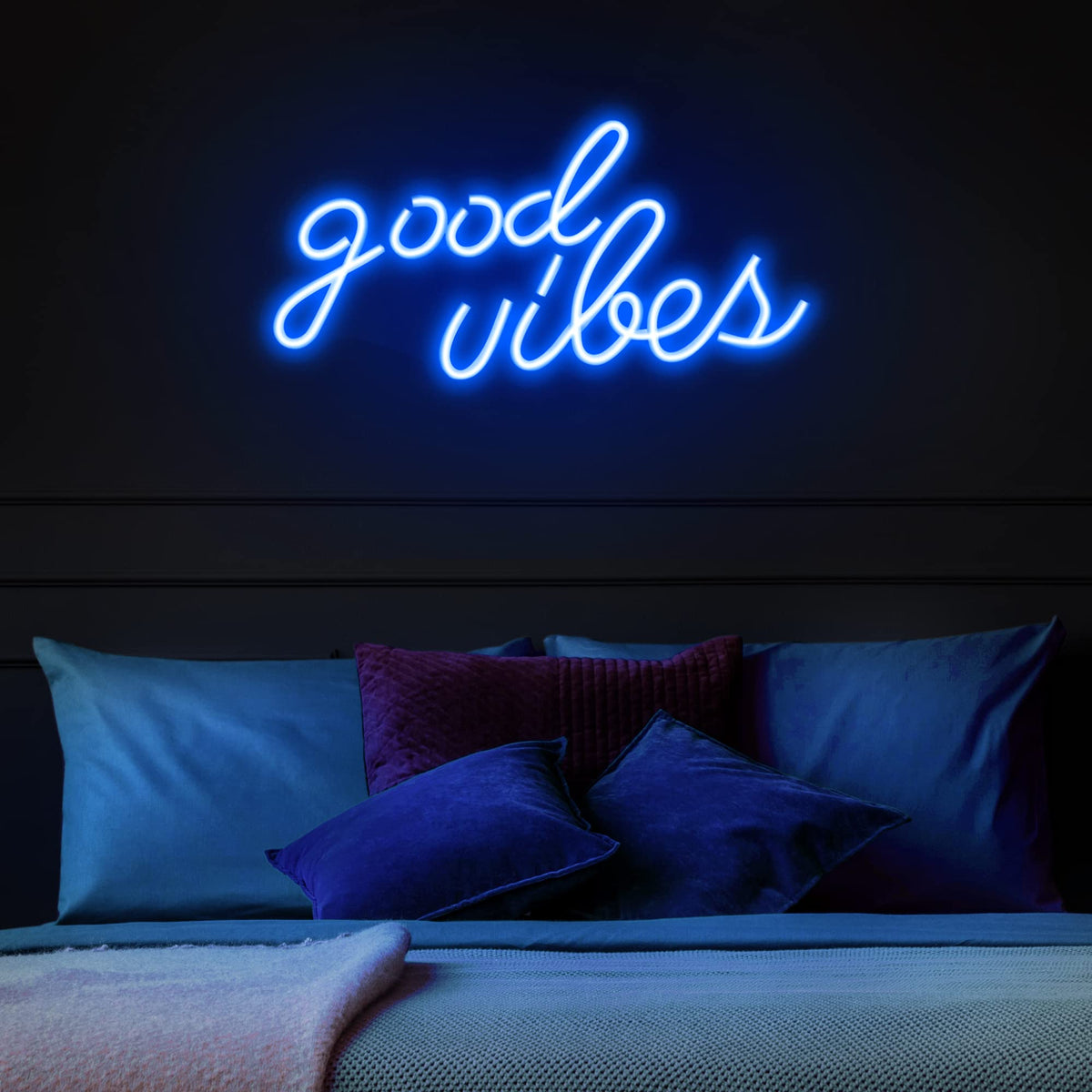 Close-up of Olekki Good Vibes neon sign glow highlighting crisp blue light