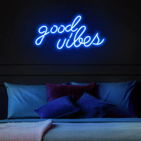 Close-up of Olekki Good Vibes neon sign glow highlighting crisp blue light