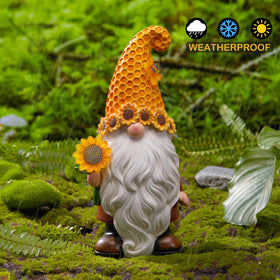 Olekki weatherproof garden gnome stands up to rain and sun.