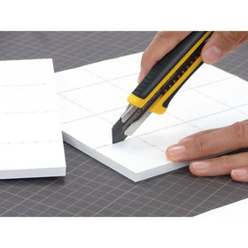 OLFA fiberglass-reinforced handle improves grip and chemical resistance under demanding use.