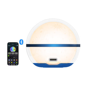OLIGHT Sphere C night light on table provides soft ambient glow for evenings.