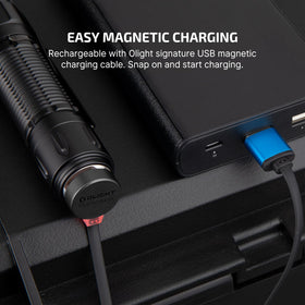 olight Warrior 3S battery indicators around the switch show power level