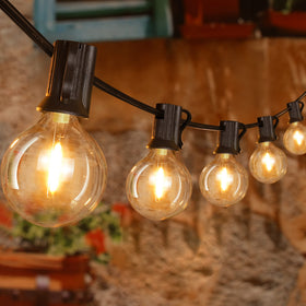 Ollny 100ft outdoor string lights, wide view for patios and gatherings.