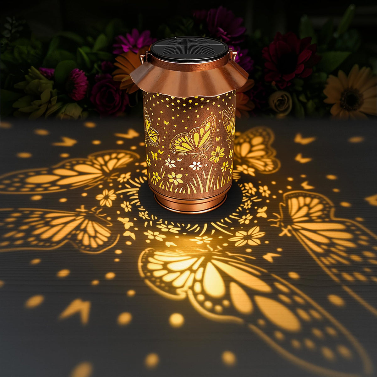 Ollny solar butterfly lantern outdoors with warm glow for garden decor.