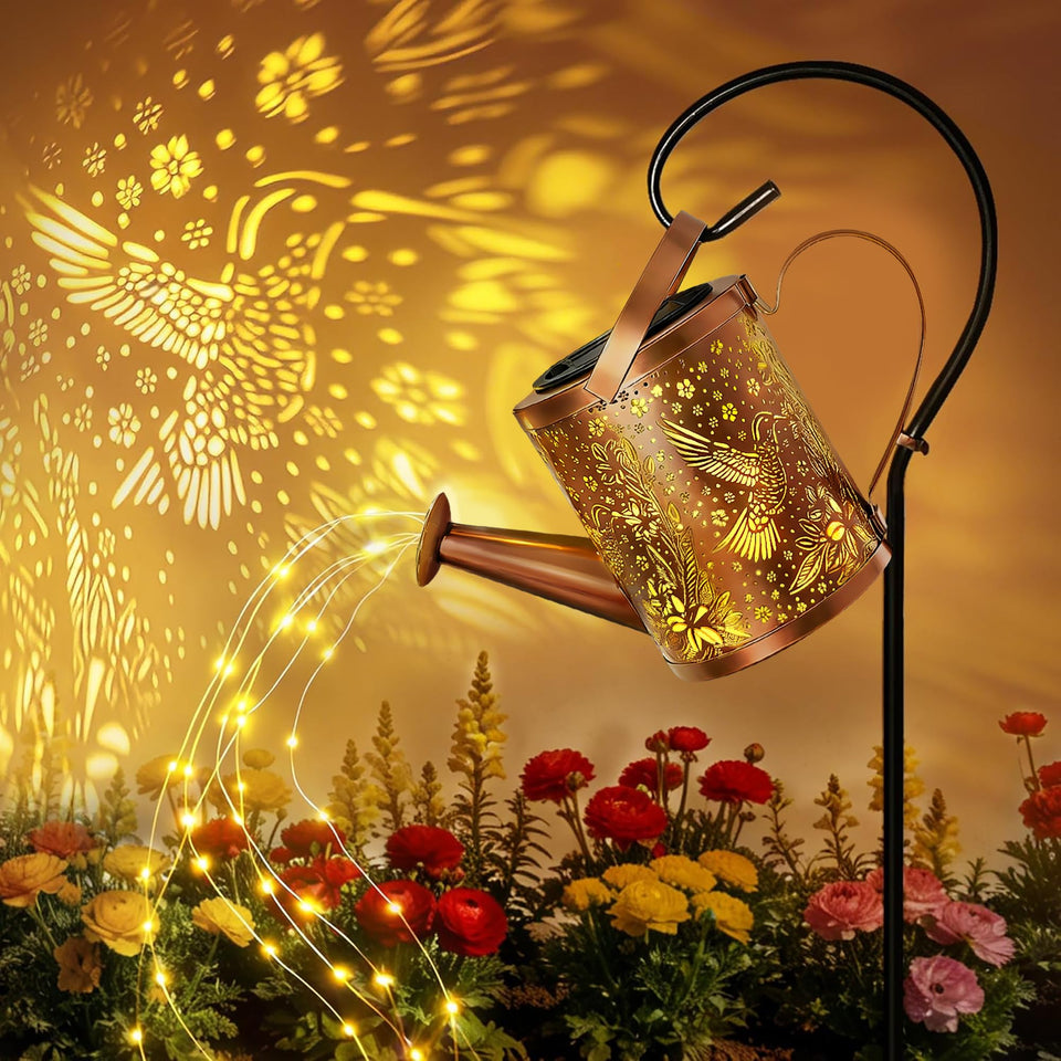 Ollny solar watering can lantern with cascading lights brightens outdoor spaces at dusk.