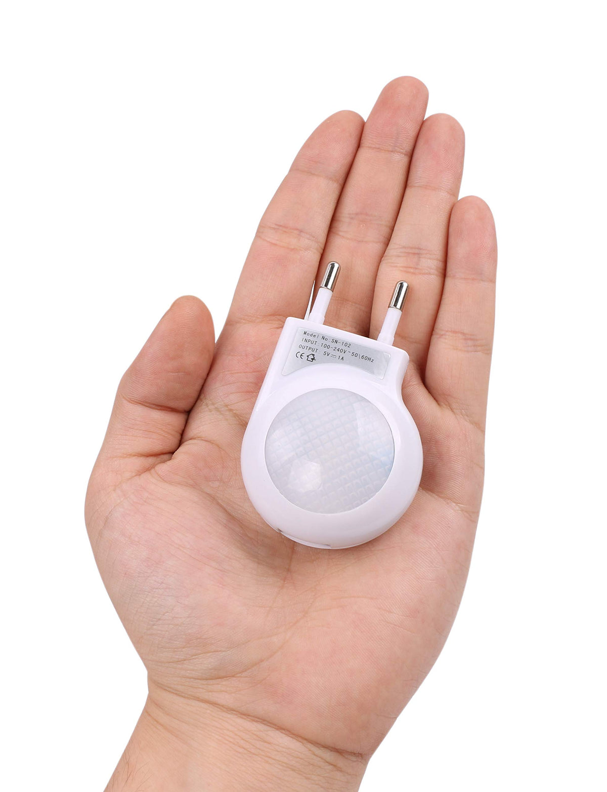 Omeet portable LED night light with white body provides gentle illumination on demand.