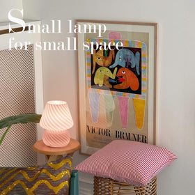 ONEWISH mushroom lamp on a table in a cafe-style setting offers versatile lighting