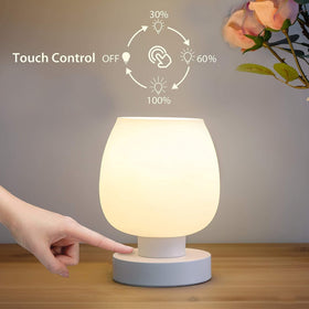 ONEWISH compact bedside lamp on nightstand with sleek base.