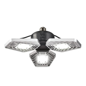 Ontel Beyond Bright LED garage light in use illuminating a workshop