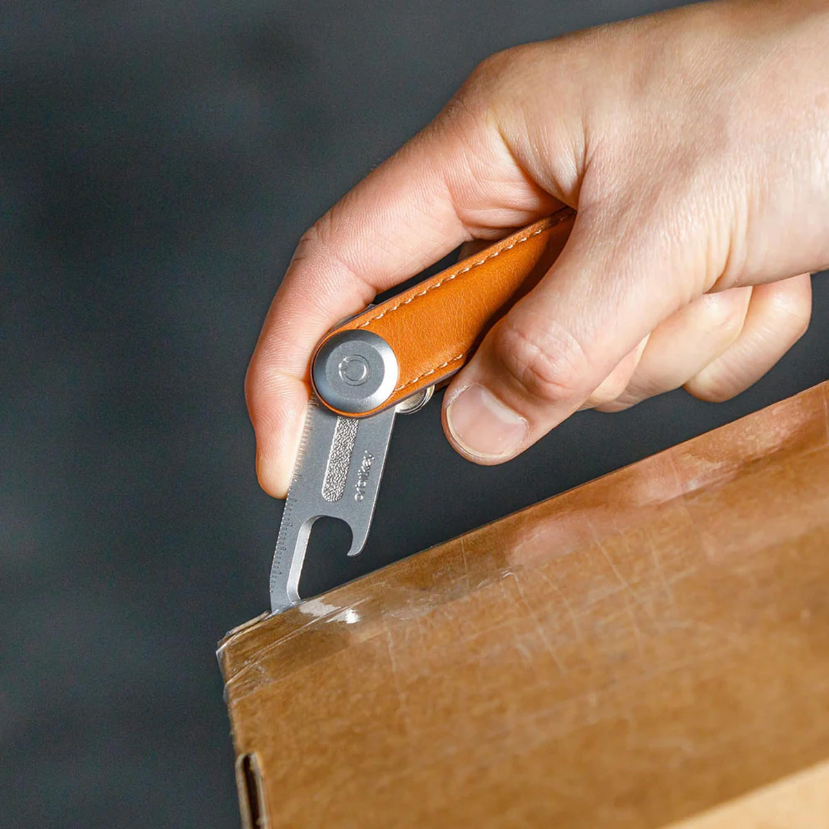 Orbitkey Multi-Tool V2 silver tucked with keys for carry