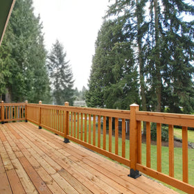ORIGLE matte black post base resists corrosion for long outdoor use.