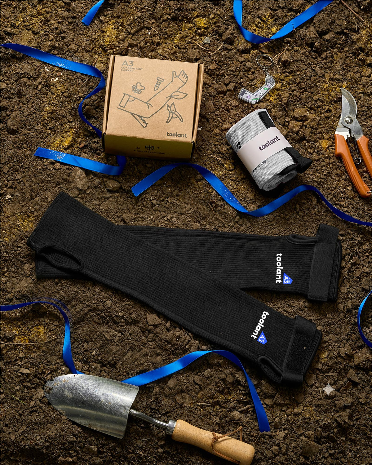 OriStout gardening sleeves close-up shows durable HPPE fabric and thumb hole