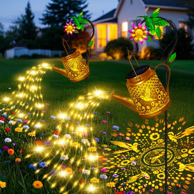 Ostritec hummingbird solar watering can lights illuminate garden path with twinkling cascade.