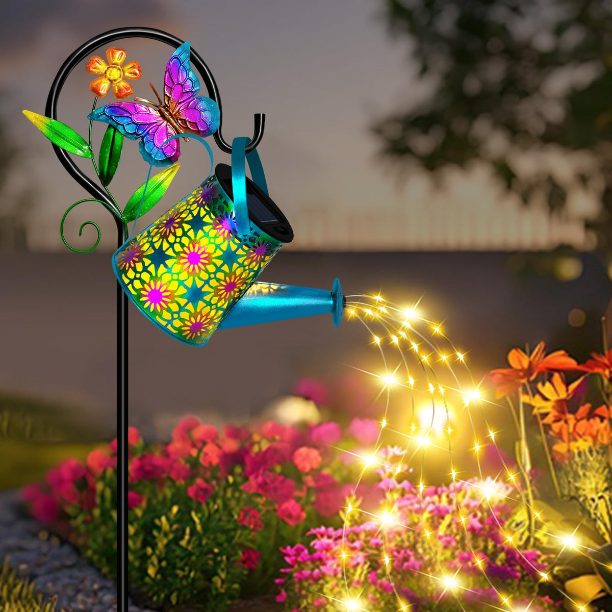 Ostritec solar watering can lights creates a blue waterfall effect in outdoor spaces.