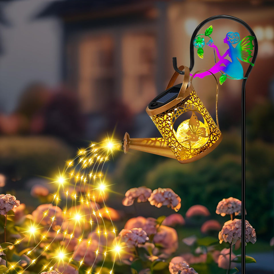 Ostritec Solar Watering Can Lights illuminate garden borders with warm glow