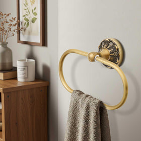 Otoolling wall-mounted brass bathroom hardware adds vintage style and easy cleaning.