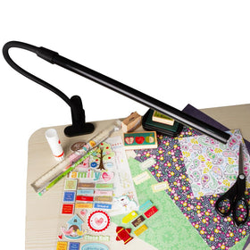 OttLite clip-on lamp includes convenient on/off switch for quick control.