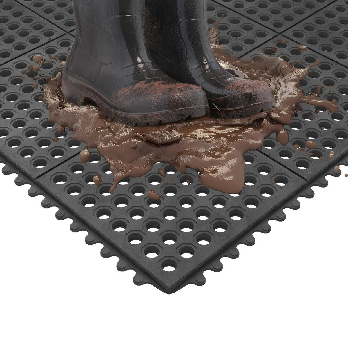 Ottomanson waterproof mat shown being hose-cleaned for fast maintenance.