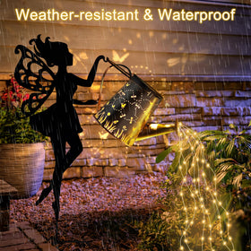Ouddy Decor hanging lanterns and waterfall lights brighten flower beds at night.