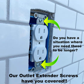 Outlet Extender Buddy wall-plate screws fitted with spacers for precise alignment.