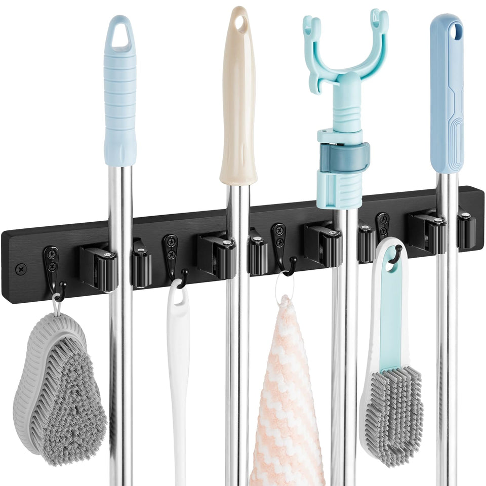 Outnili black mop holder on wall with four slots keeps brooms neatly stored and ready