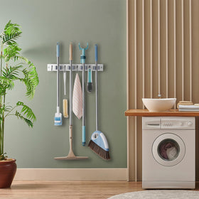 OUTNILI modern-country look blends with any decor while organizing cleaning tools.