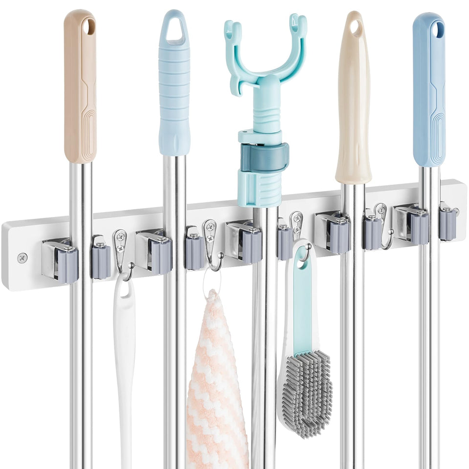 OUTNILI mop and broom holder mounted on a white wall for clutter-free storage.