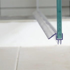 Oxelio clear PC material seal enhances transparency while protecting bathroom edges.