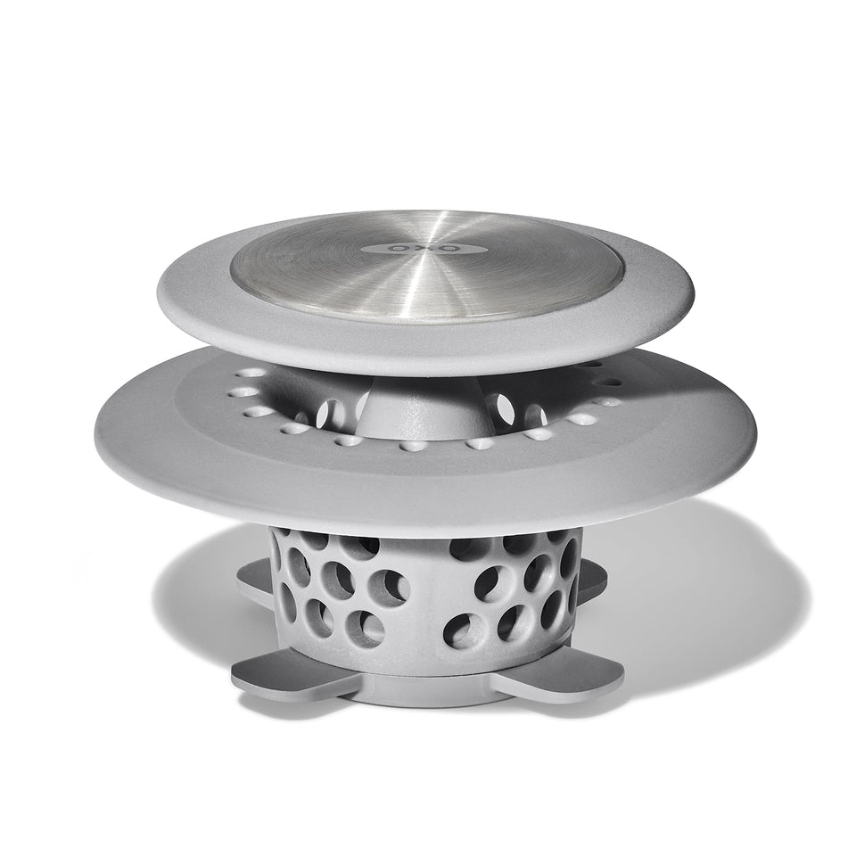 OXO Good Grips drain protector base; promotes hair capture without blocking water flow.