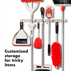 Non-slip grip locks secure long-handled tools with one-handed operation.