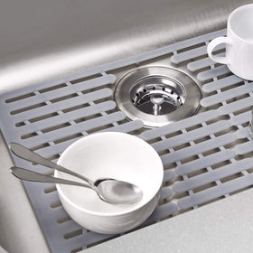 OXO Good Grips Silicone Sink Mat Large measures 16.25 in x 12.75 in.
