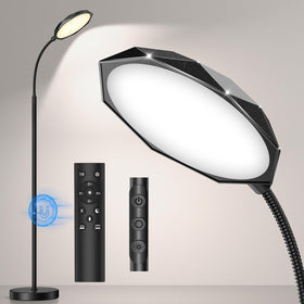 PACOVY floor lamp with diamond-surface head delivers warm ambient lighting.