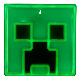 Paladone Creeper LED wall light with vibrant green glow.