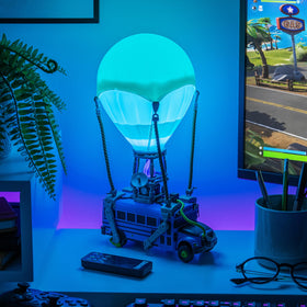 Paladone Fortnite Battle Bus Light with built-in headphone stand keeps gear organized.