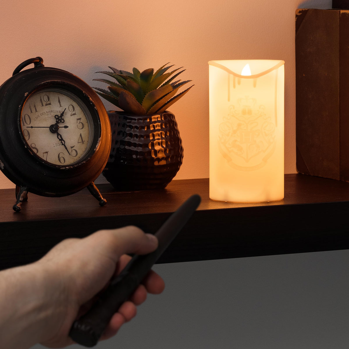 Paladone Hogwarts Crest Candle with wand remote for effortless lighting.