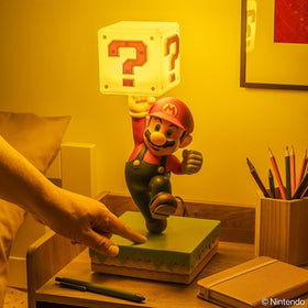 Paladone lamp shows tap-activated brightness control for Mario scene lighting