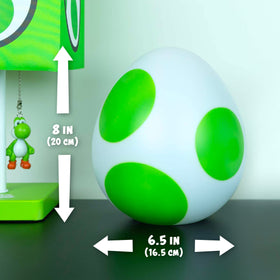 Paladone Yoshi Egg Light brightens a desk setup for gaming sessions.