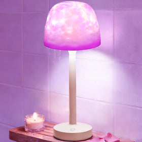 PandaTOP 2-in-1 shower lamp with shade on for soft bedside lighting.